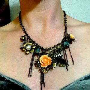 Antique style butterfly and flower necklace